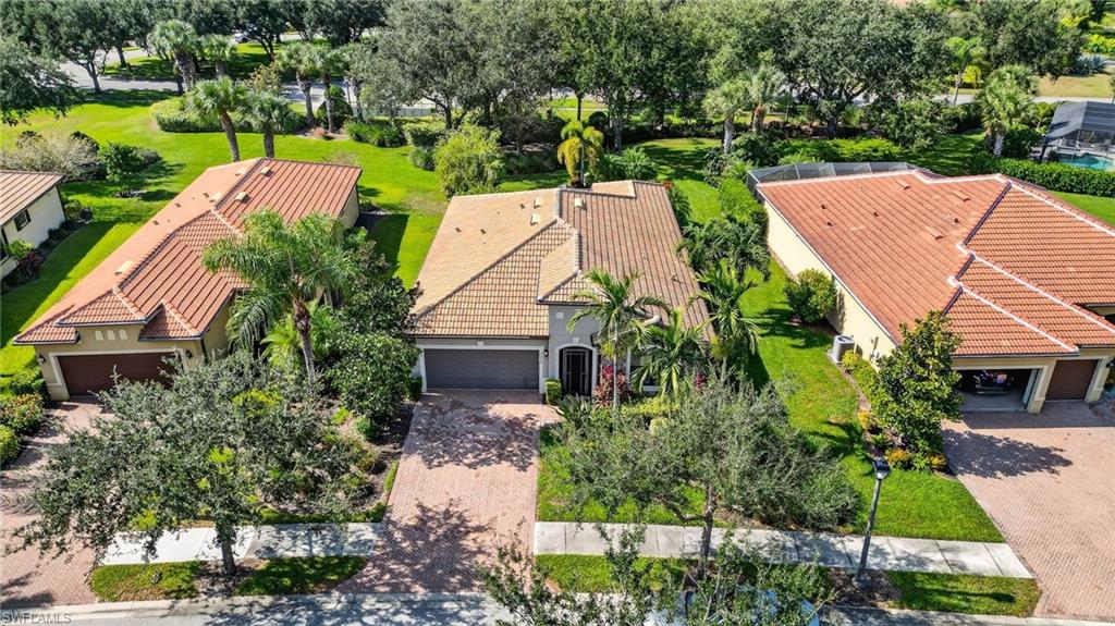 5215 Ciatto Way Ave Maria, FL 34142 - Photo 33 of 46 an aerial view of a house with yard swimming pool and outdoor seating