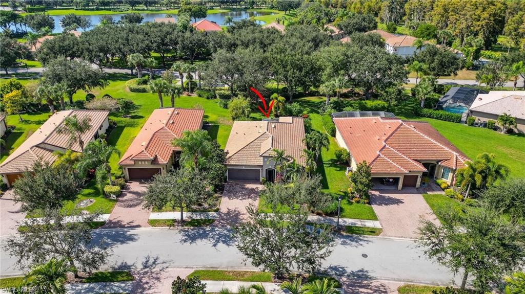 5215 Ciatto Way Ave Maria, FL 34142 - Photo 34 of 46 an aerial view of house with swimming pool outdoor seating and yard