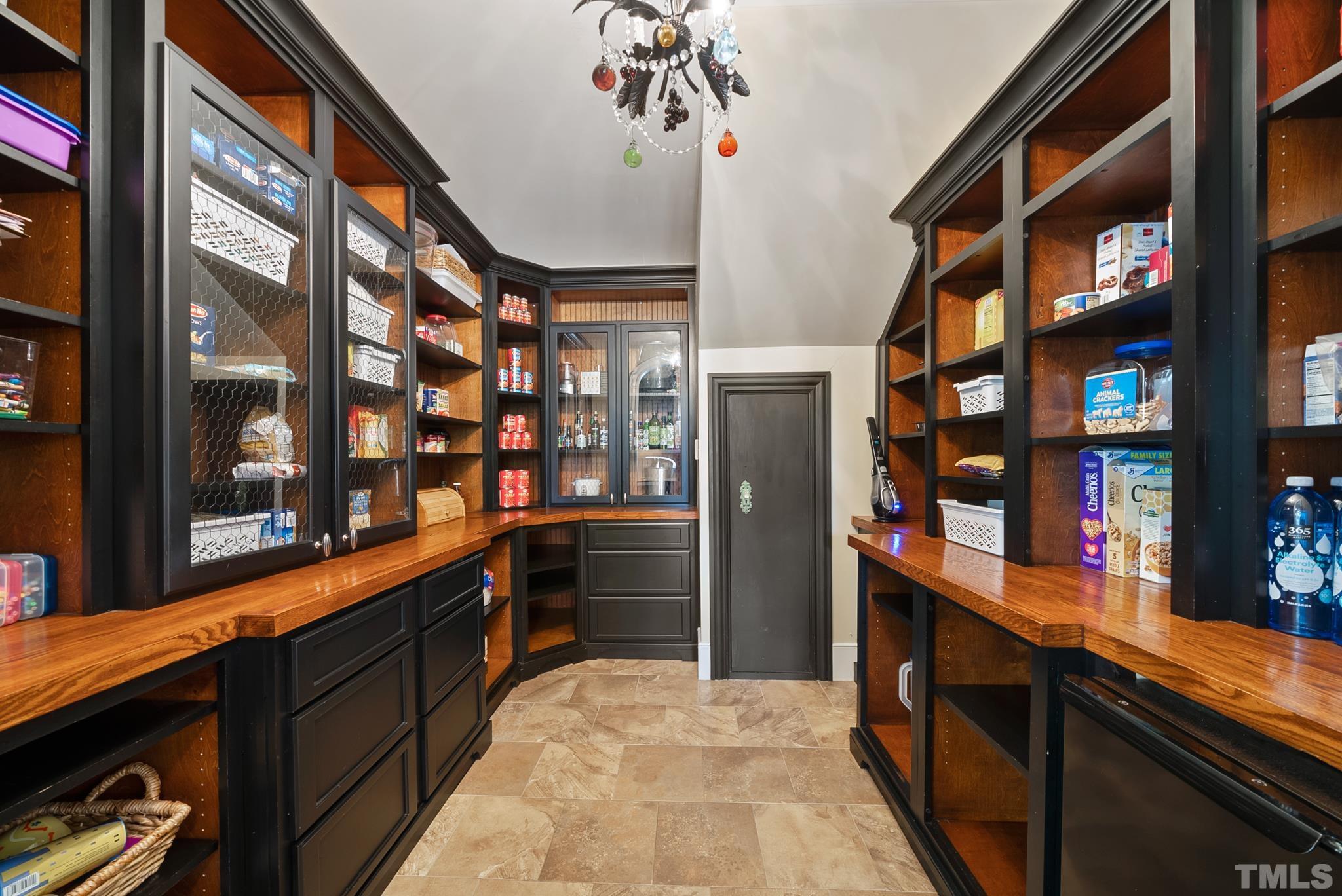 1204 Hedgelawn Way Raleigh, NC 27615 - Photo 11 of 44 a kitchen with stainless steel appliances a sink and cabinets