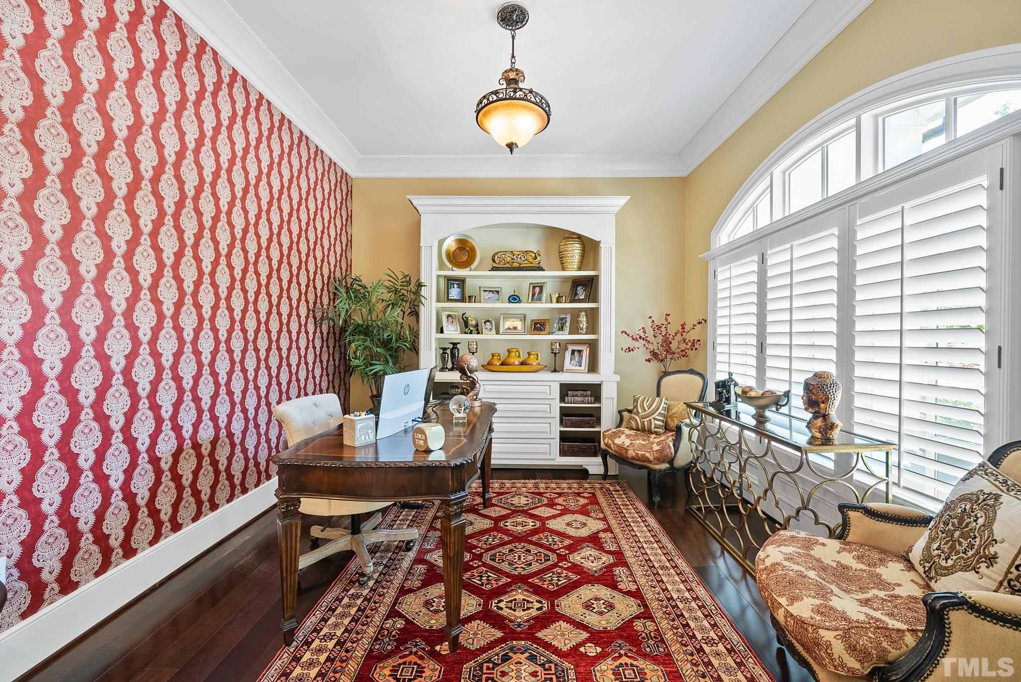 1204 Hedgelawn Way Raleigh, NC 27615 - Photo 17 of 44 a living room with furniture and a large window