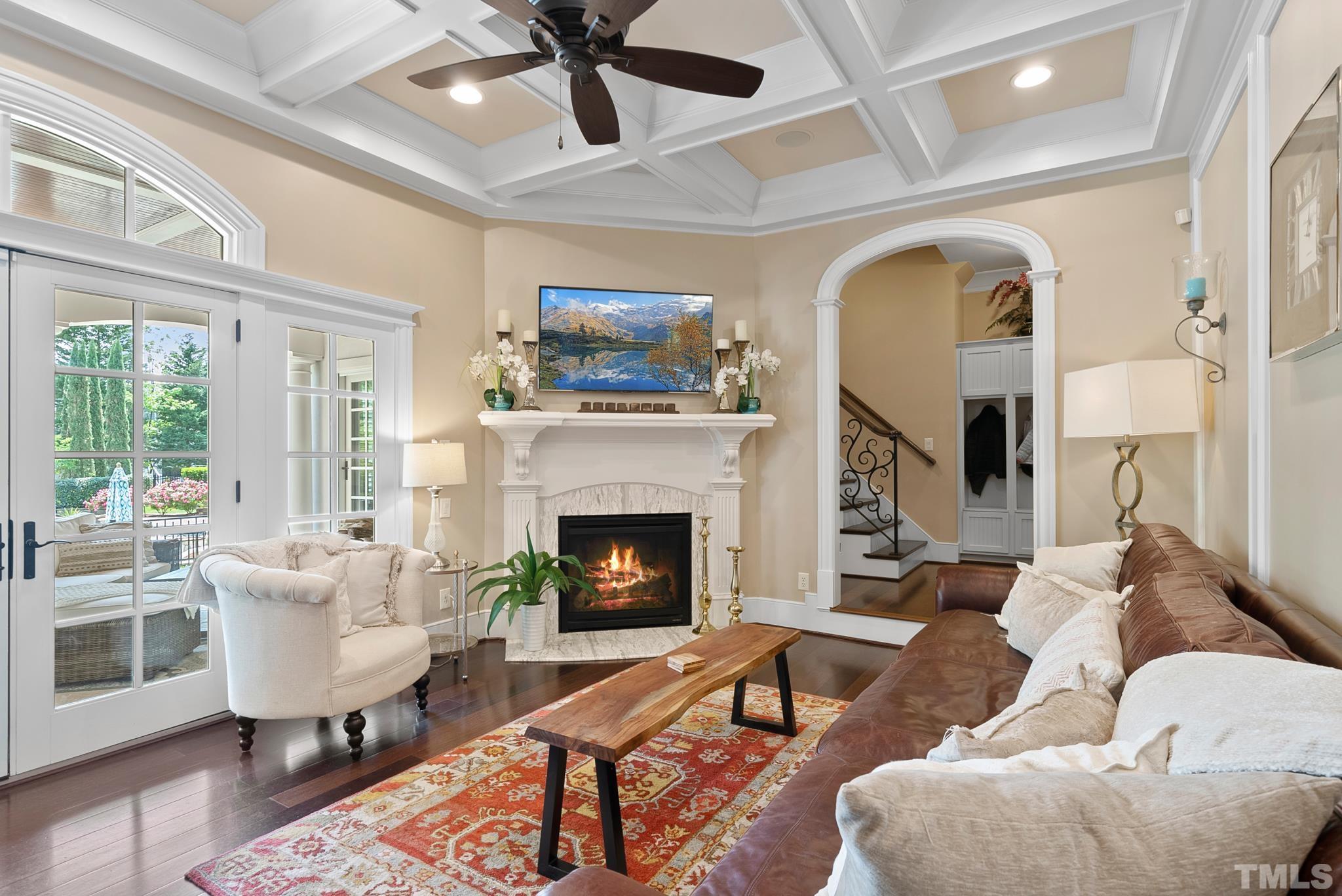 1204 Hedgelawn Way Raleigh, NC 27615 - Photo 18 of 44 a living room with furniture and a fireplace