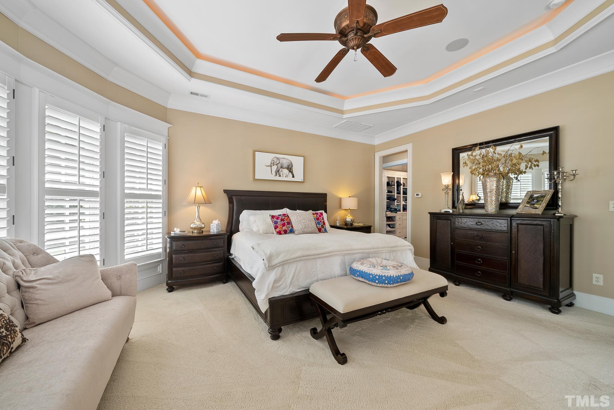 1204 Hedgelawn Way Raleigh, NC 27615 - Photo 21 of 44 a bedroom with a bed and furniture