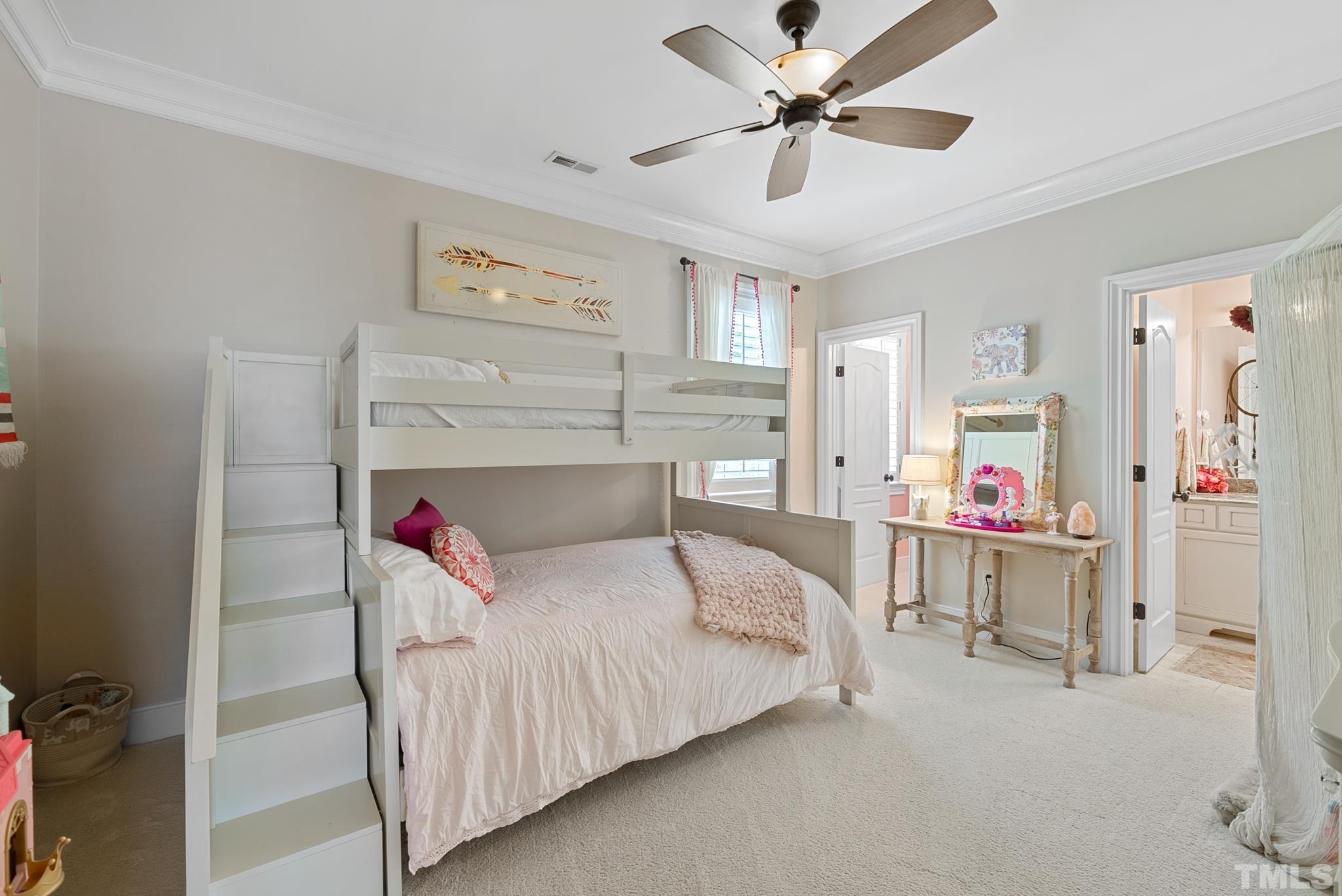 1204 Hedgelawn Way Raleigh, NC 27615 - Photo 25 of 44 a living room with furniture and a chandelier
