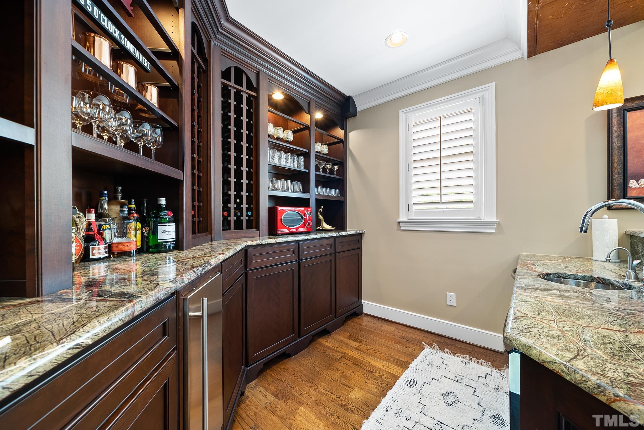 1204 Hedgelawn Way Raleigh, NC 27615 - Photo 29 of 44 a kitchen with granite countertop granite top and stainless steel appliances