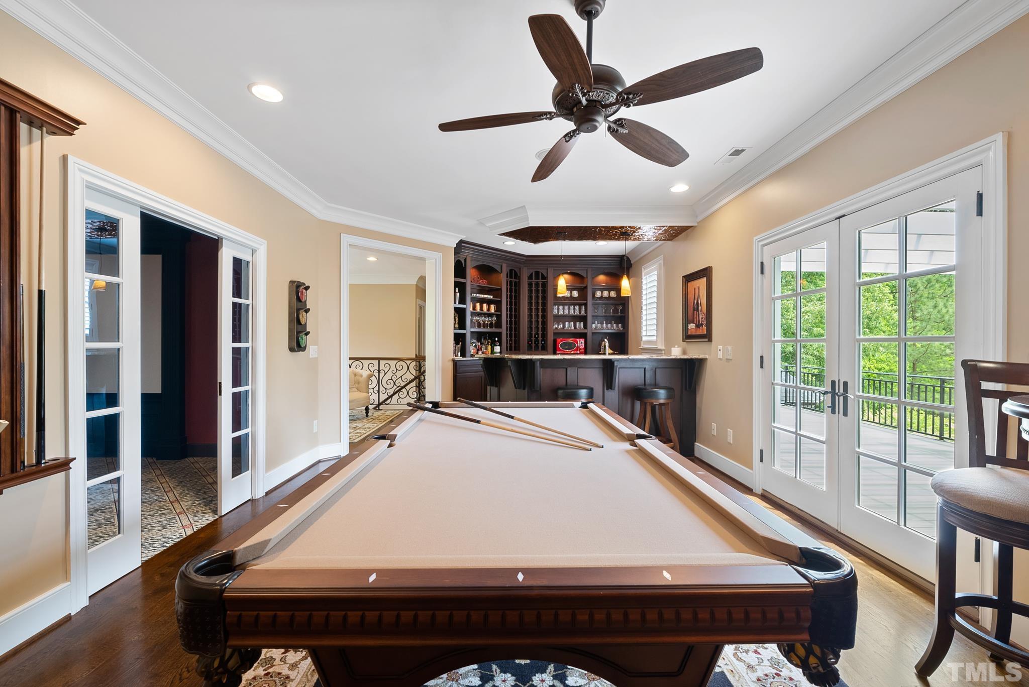 1204 Hedgelawn Way Raleigh, NC 27615 - Photo 30 of 44 a room with pool table and windows