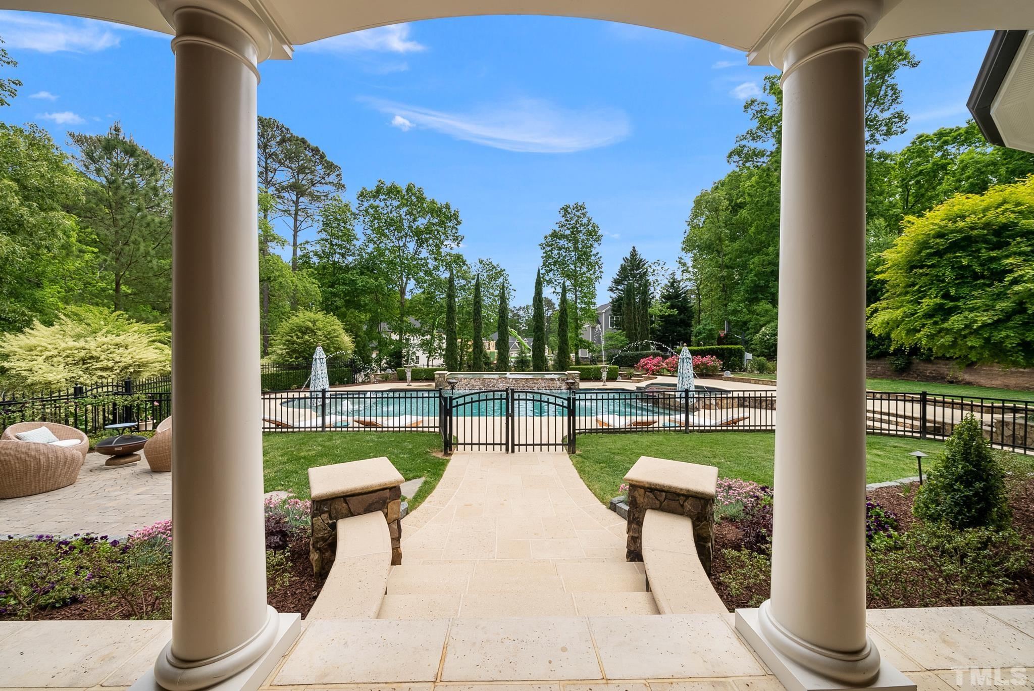 1204 Hedgelawn Way Raleigh, NC 27615 - Photo 3 of 44 a view of swimming pool with outdoor seating and a patio