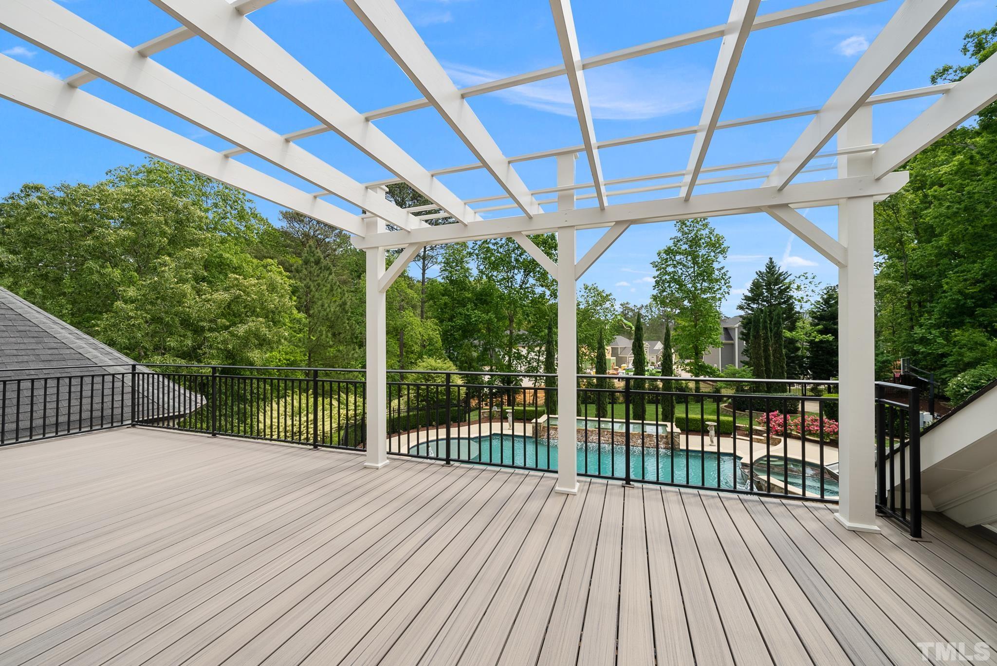 1204 Hedgelawn Way Raleigh, NC 27615 - Photo 32 of 44 a view of a balcony with wooden floor