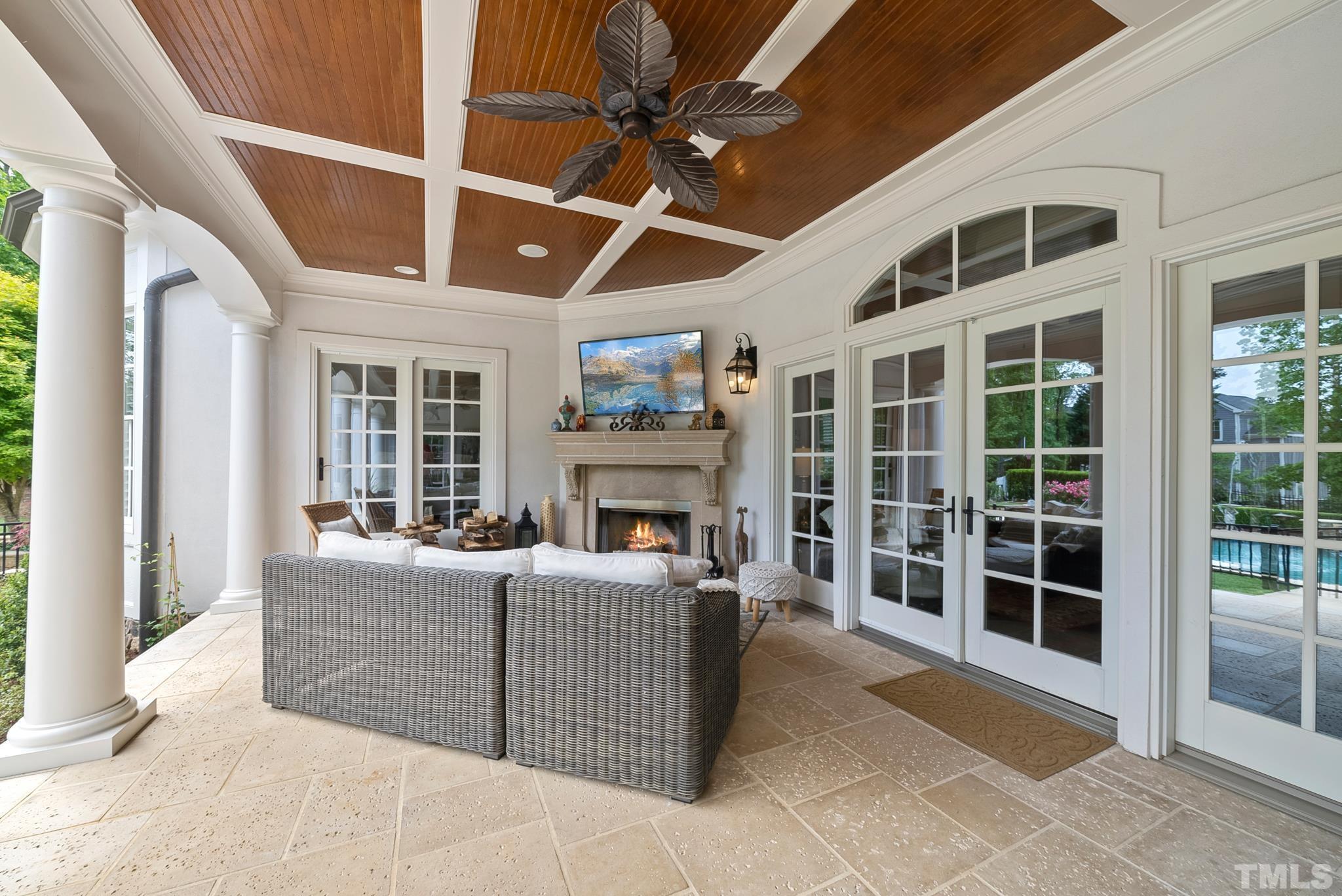 1204 Hedgelawn Way Raleigh, NC 27615 - Photo 34 of 44 a living room with furniture a fireplace and a large window