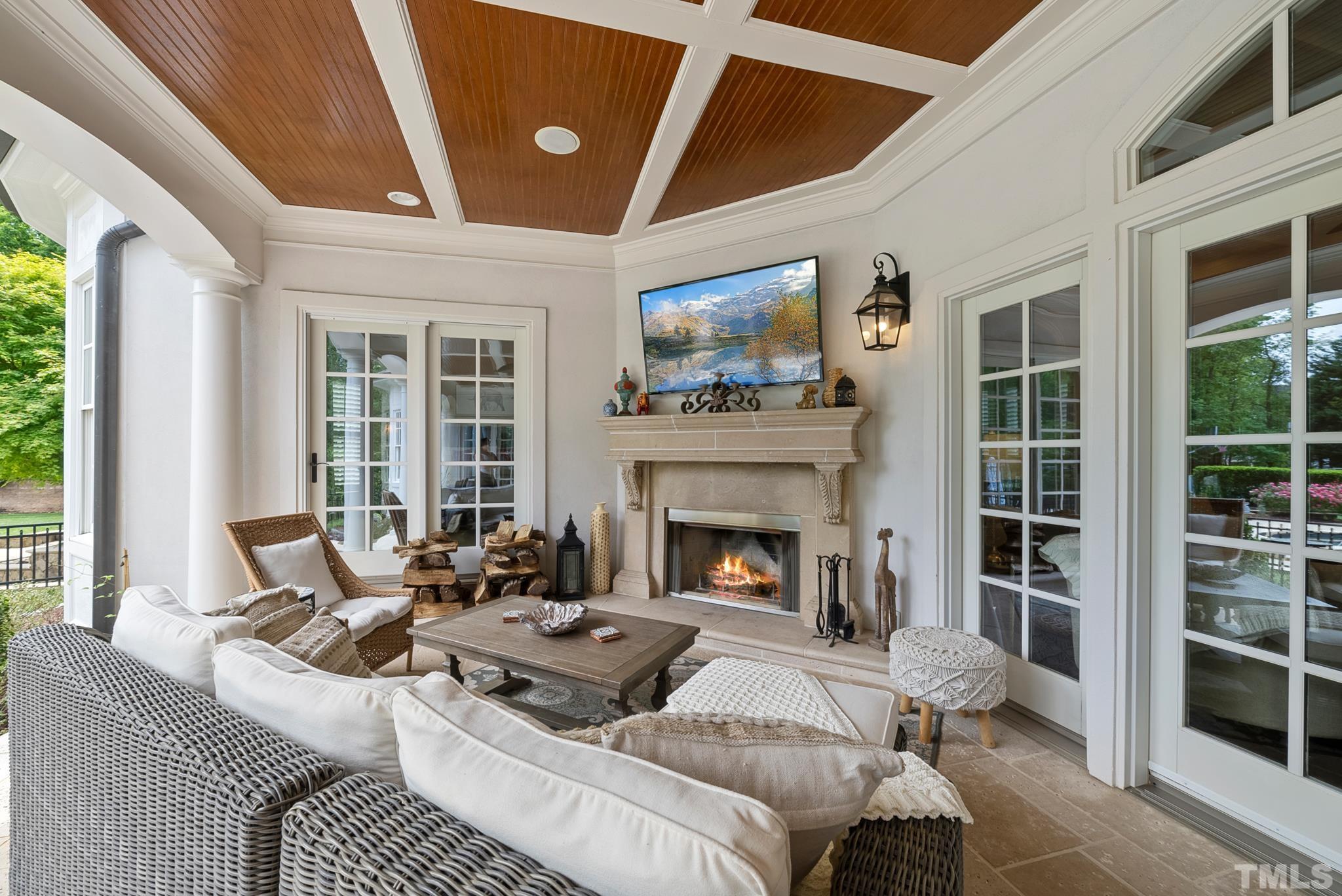 1204 Hedgelawn Way Raleigh, NC 27615 - Photo 35 of 44 a living room with furniture and a fireplace
