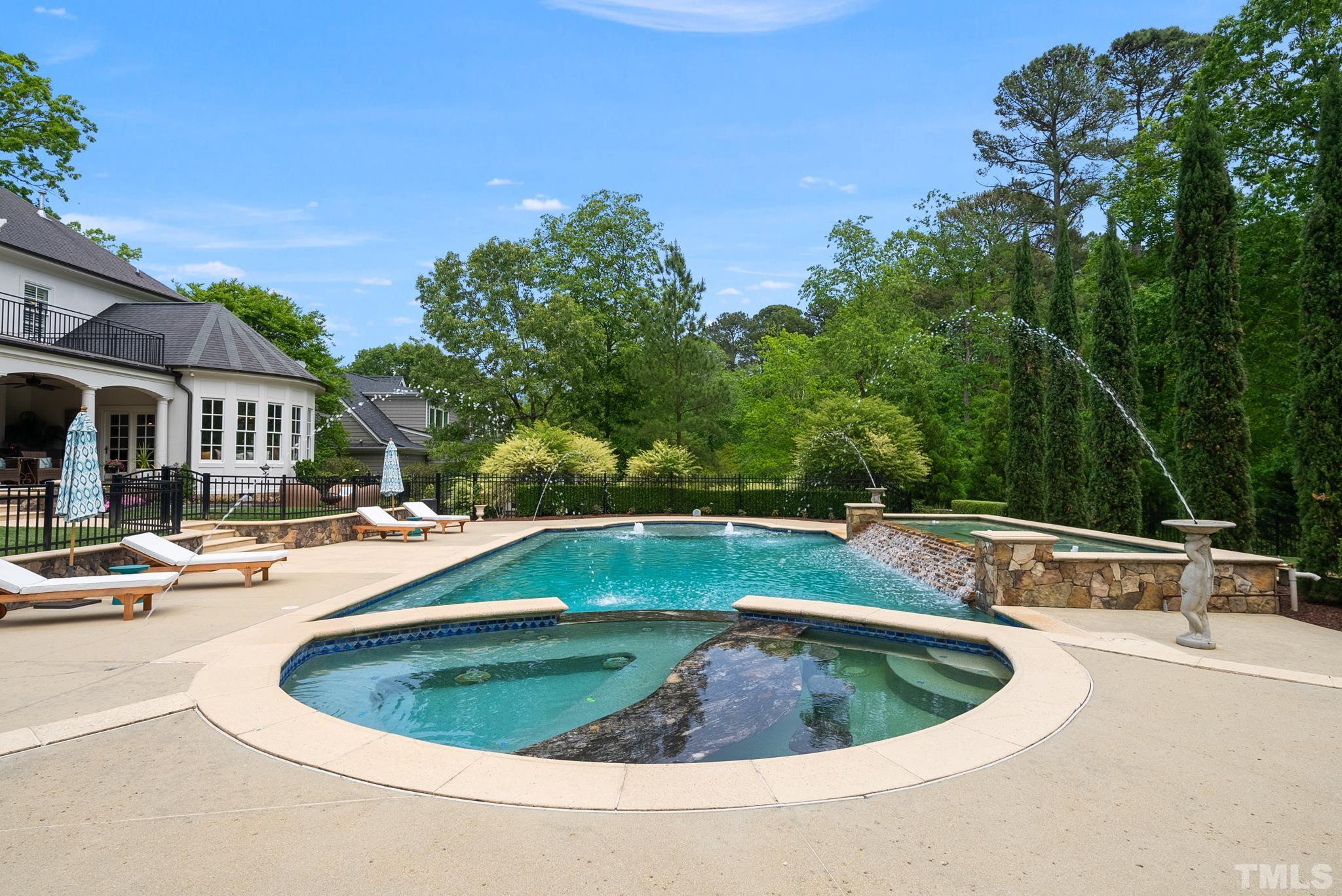 1204 Hedgelawn Way Raleigh, NC 27615 - Photo 39 of 44 a view of a swimming pool with a patio