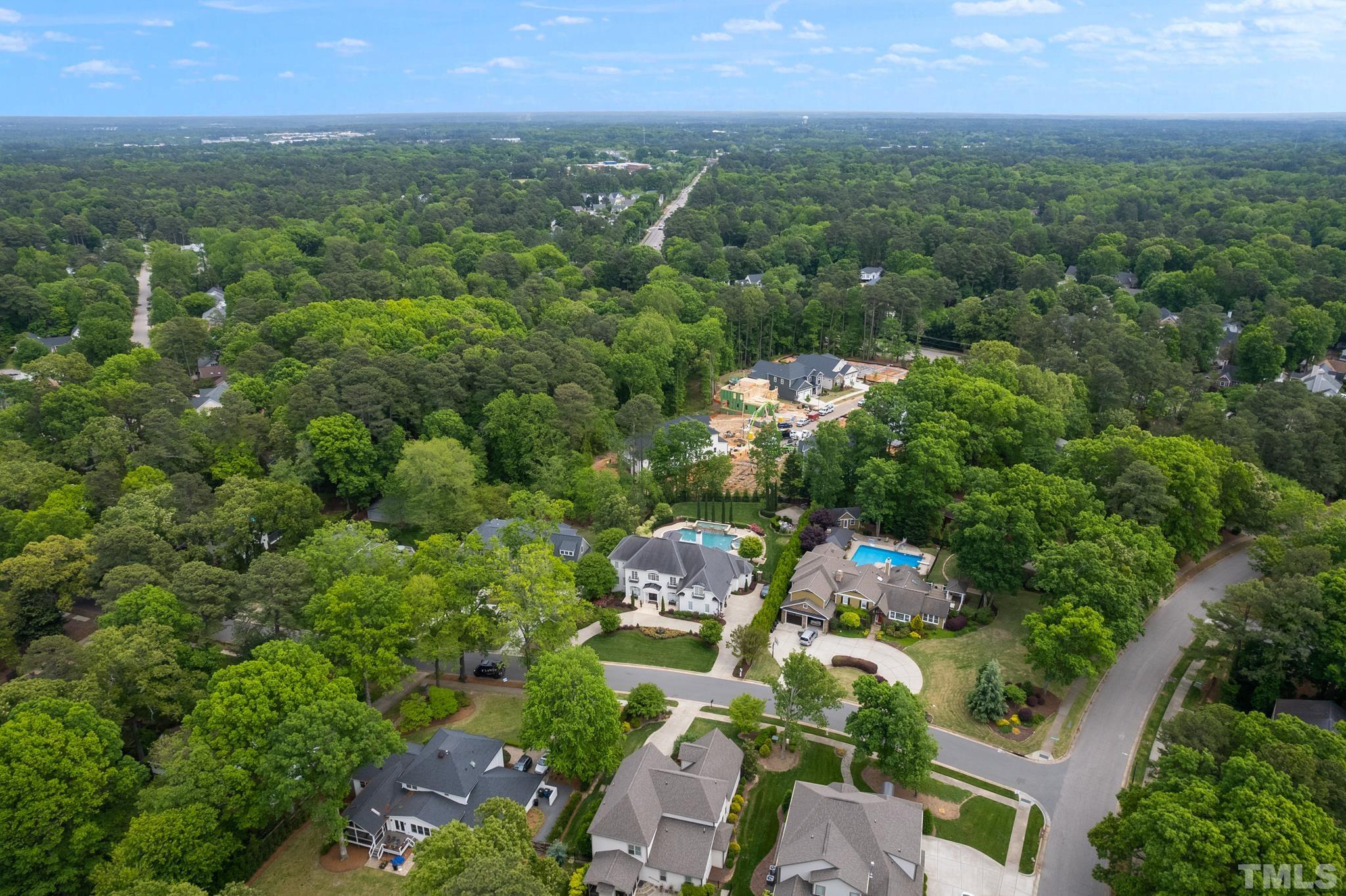 1204 Hedgelawn Way Raleigh, NC 27615 - Photo 43 of 44 an aerial view of a city with lots of residential buildings