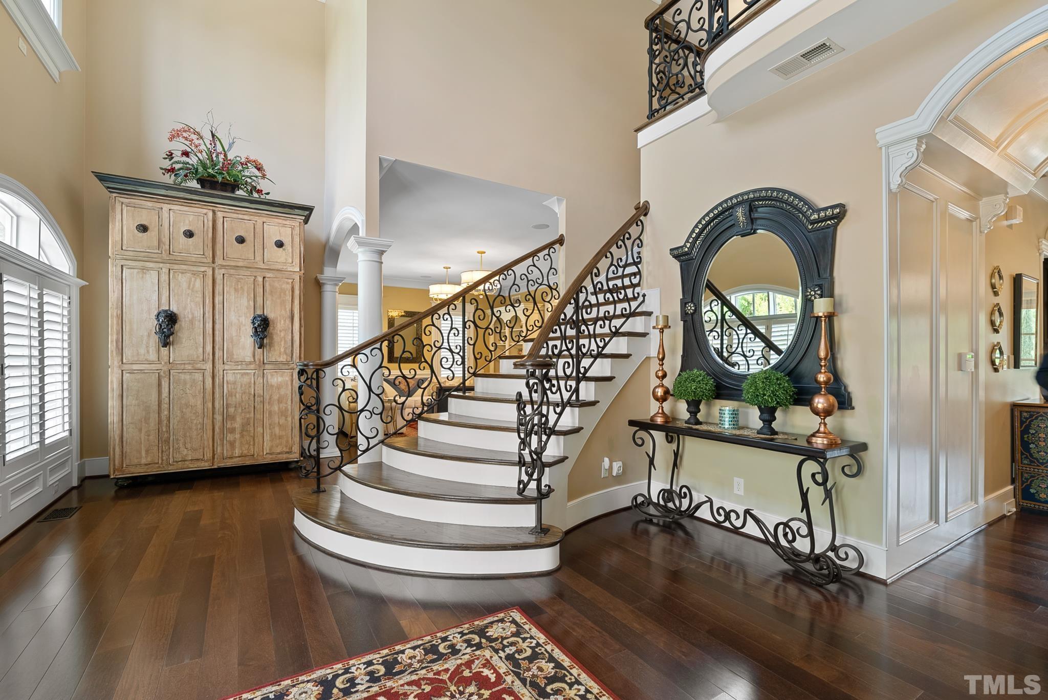 1204 Hedgelawn Way Raleigh, NC 27615 - Photo 6 of 44 a view of entryway with wooden floor