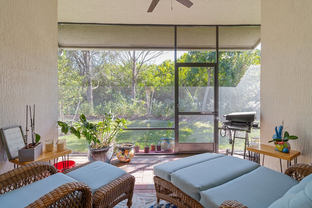 5967 Bella Rosa Lane Vero Beach, FL 32966 - Photo 21 of 30 a living room with furniture and a window