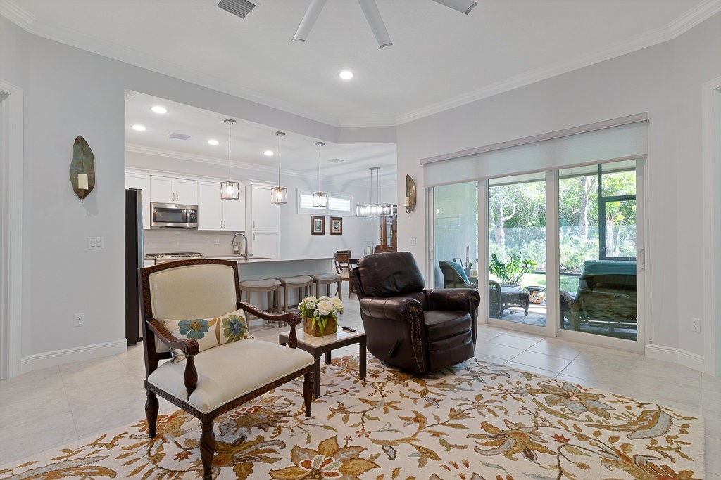 5967 Bella Rosa Lane Vero Beach, FL 32966 - Photo 5 of 30 a living room with furniture and a window
