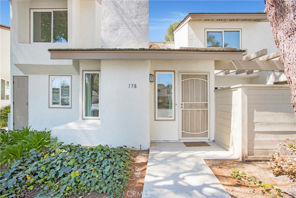 a front view of a house with a porch