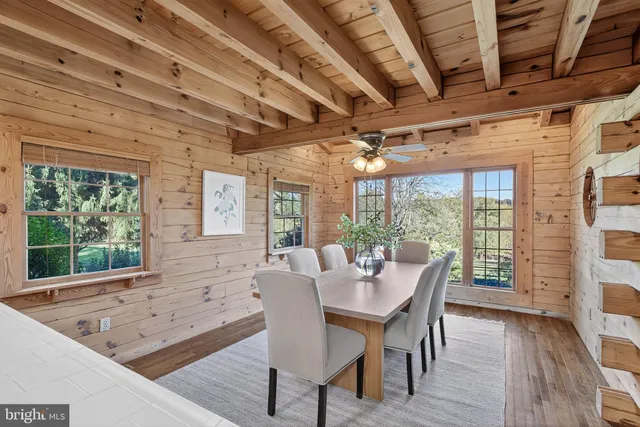a bathroom with a sink vanity and a mirror