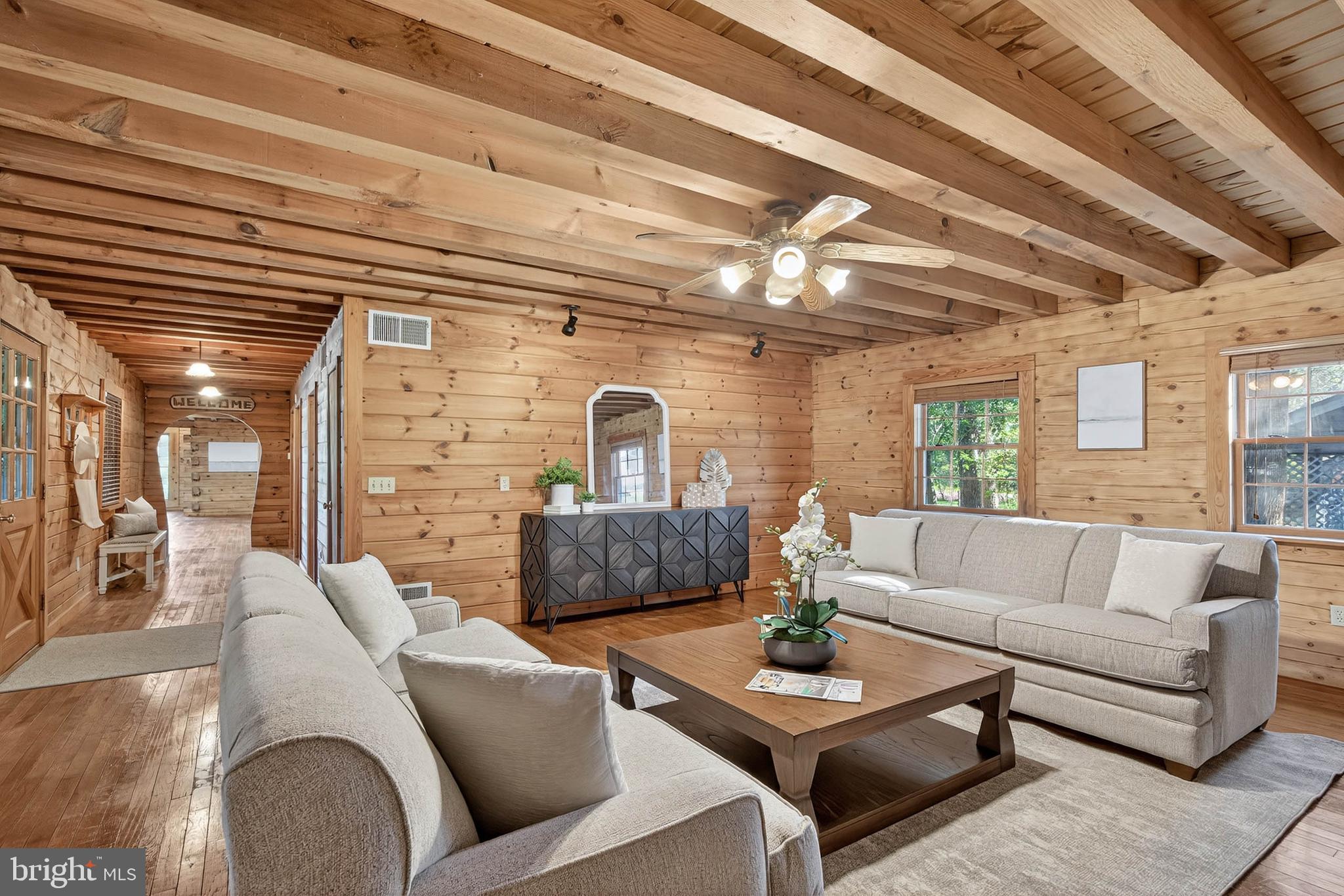 140 Arcadia Trace Peach Bottom, PA 17563 - Photo 28 of 63 a living room with furniture and a large window