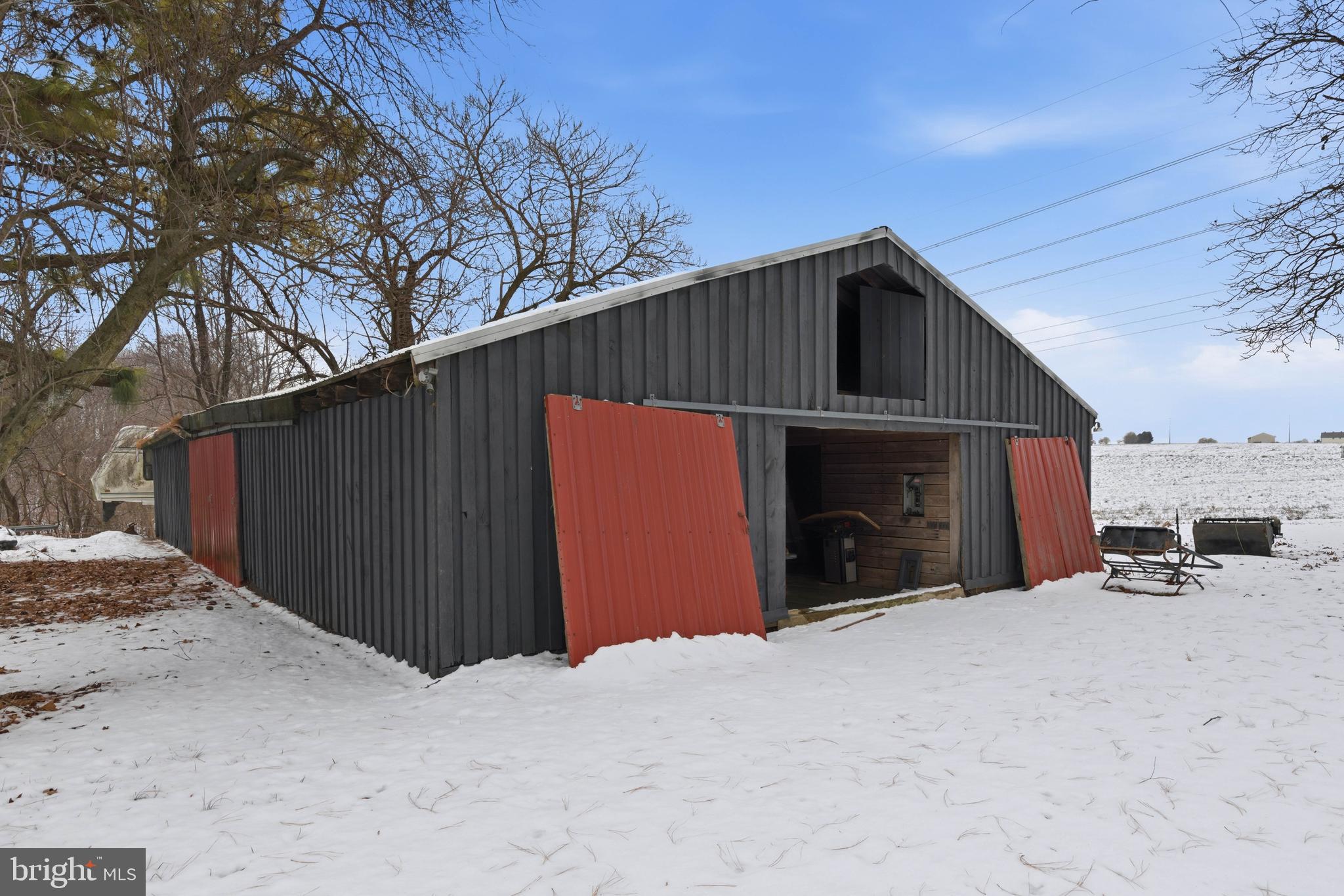 140 Arcadia Trace Peach Bottom, PA 17563 - Photo 61 of 63 a view of a house with a yard and garage