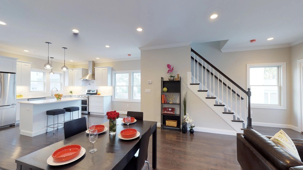 11 Sunset Road, Unit 2 Cambridge, MA 02138 - Photo 11 of 29 a dining room with furniture and wooden floor