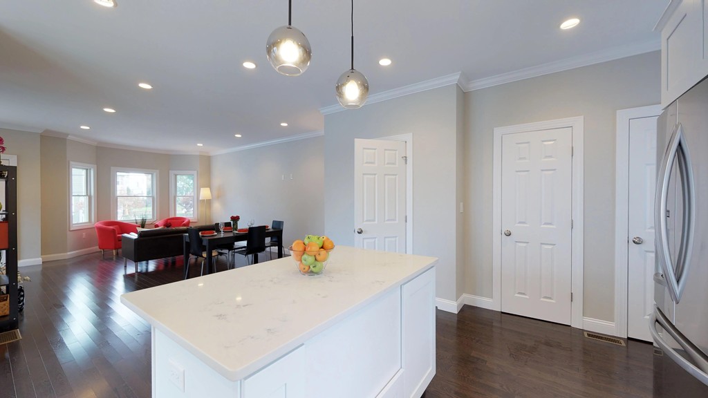 11 Sunset Road, Unit 2 Cambridge, MA 02138 - Photo 14 of 29 a view of a dining room with furniture and wooden floor