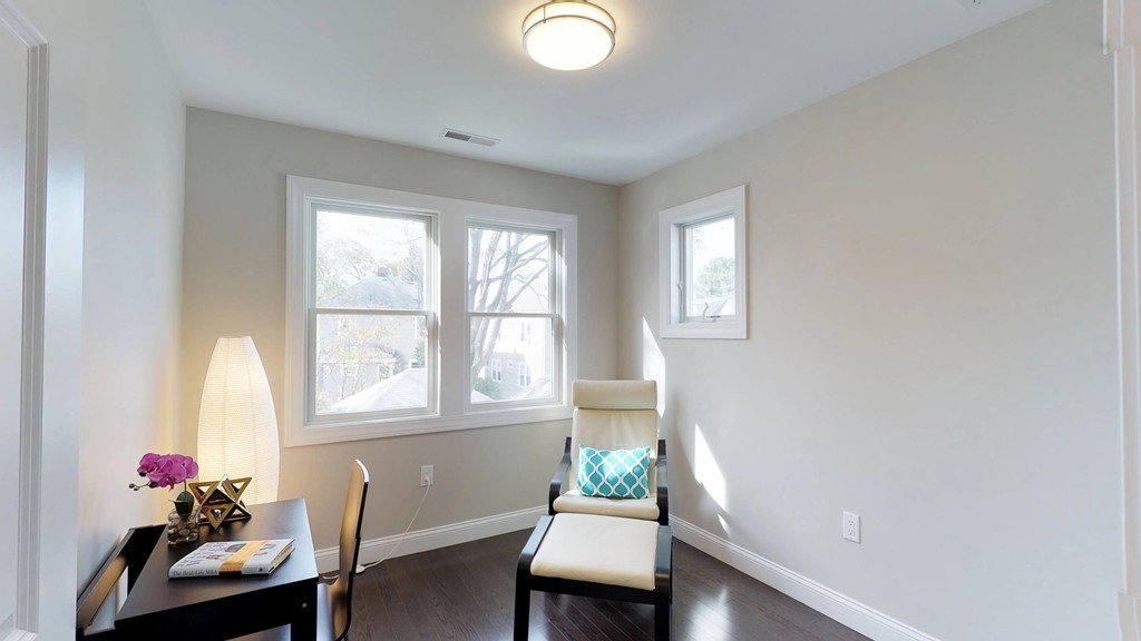 11 Sunset Road, Unit 2 Cambridge, MA 02138 - Photo 17 of 29 a room with furniture and a window