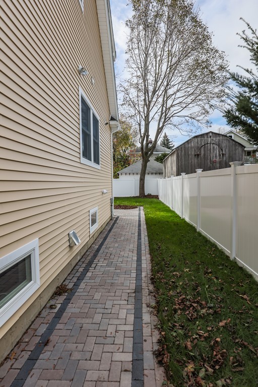 11 Sunset Road, Unit 2 Cambridge, MA 02138 - Photo 19 of 29 a view of a back yard of the house