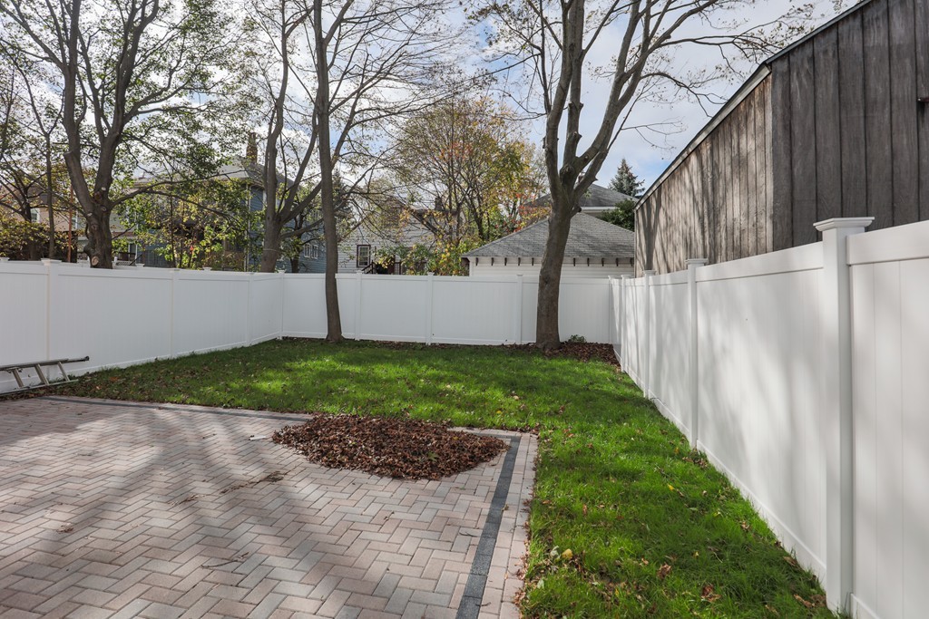 11 Sunset Road, Unit 2 Cambridge, MA 02138 - Photo 27 of 29 a view of a backyard