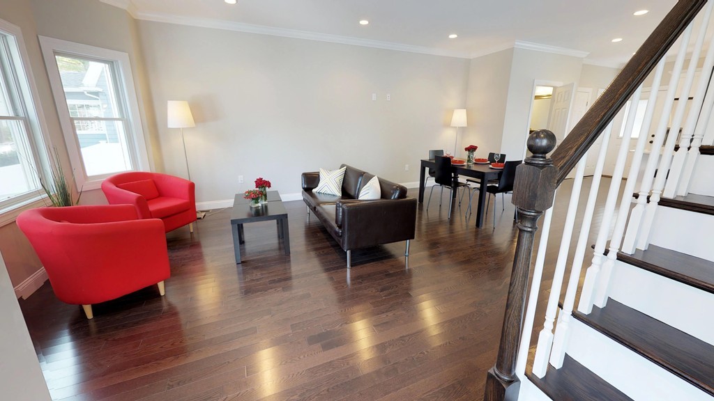 11 Sunset Road, Unit 2 Cambridge, MA 02138 - Photo 7 of 29 a living room with furniture and a wooden floor