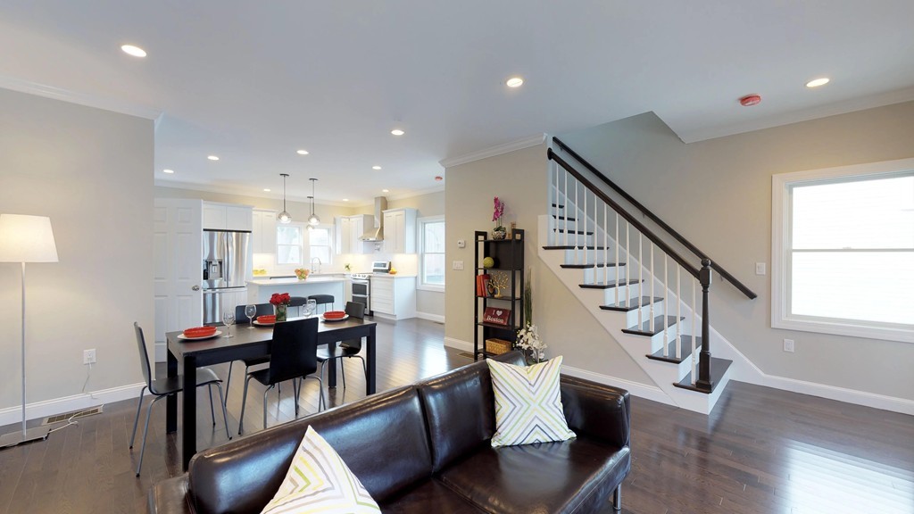 11 Sunset Road, Unit 2 Cambridge, MA 02138 - Photo 10 of 29 a view of a dining room with furniture and stairs