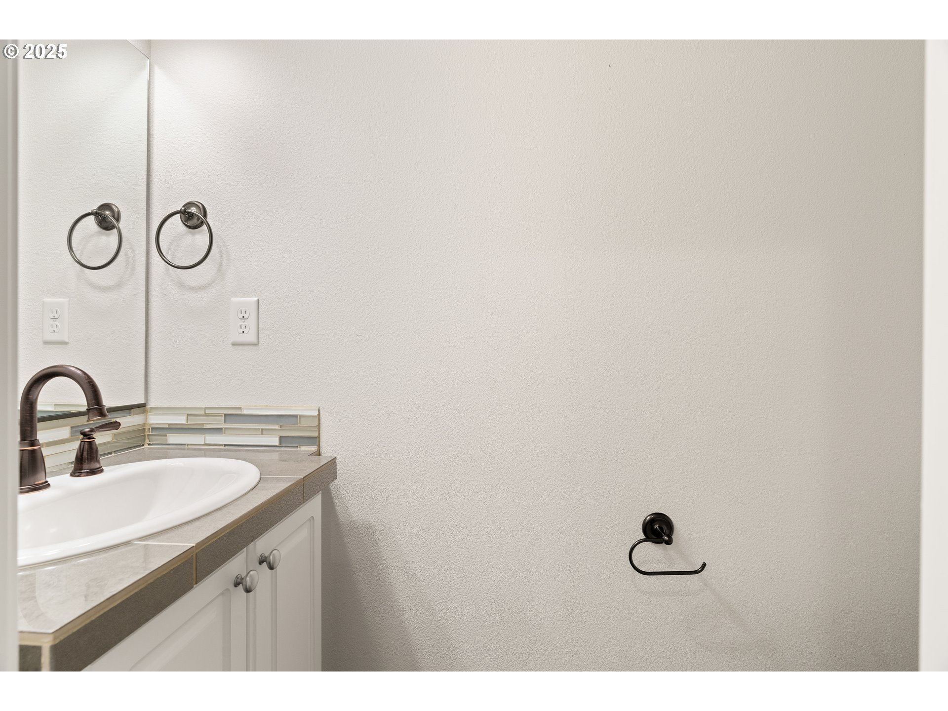 15664 Southwest Ivory Street Beaverton, OR 97007 - Photo 16 of 40 a bathroom with a sink and a mirror