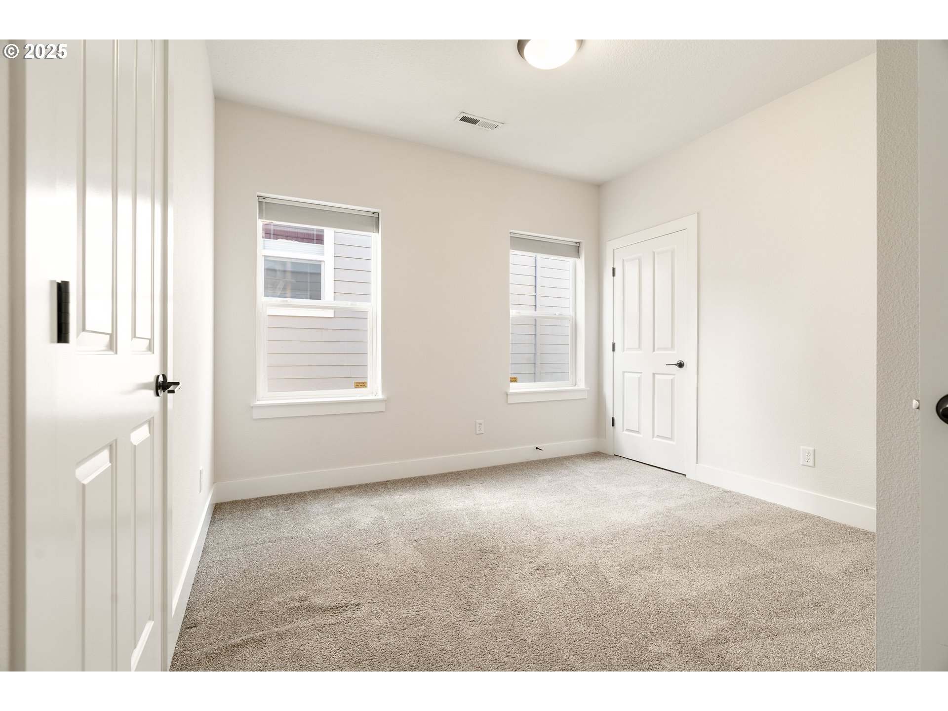15664 Southwest Ivory Street Beaverton, OR 97007 - Photo 23 of 40 a view of an empty room with a window
