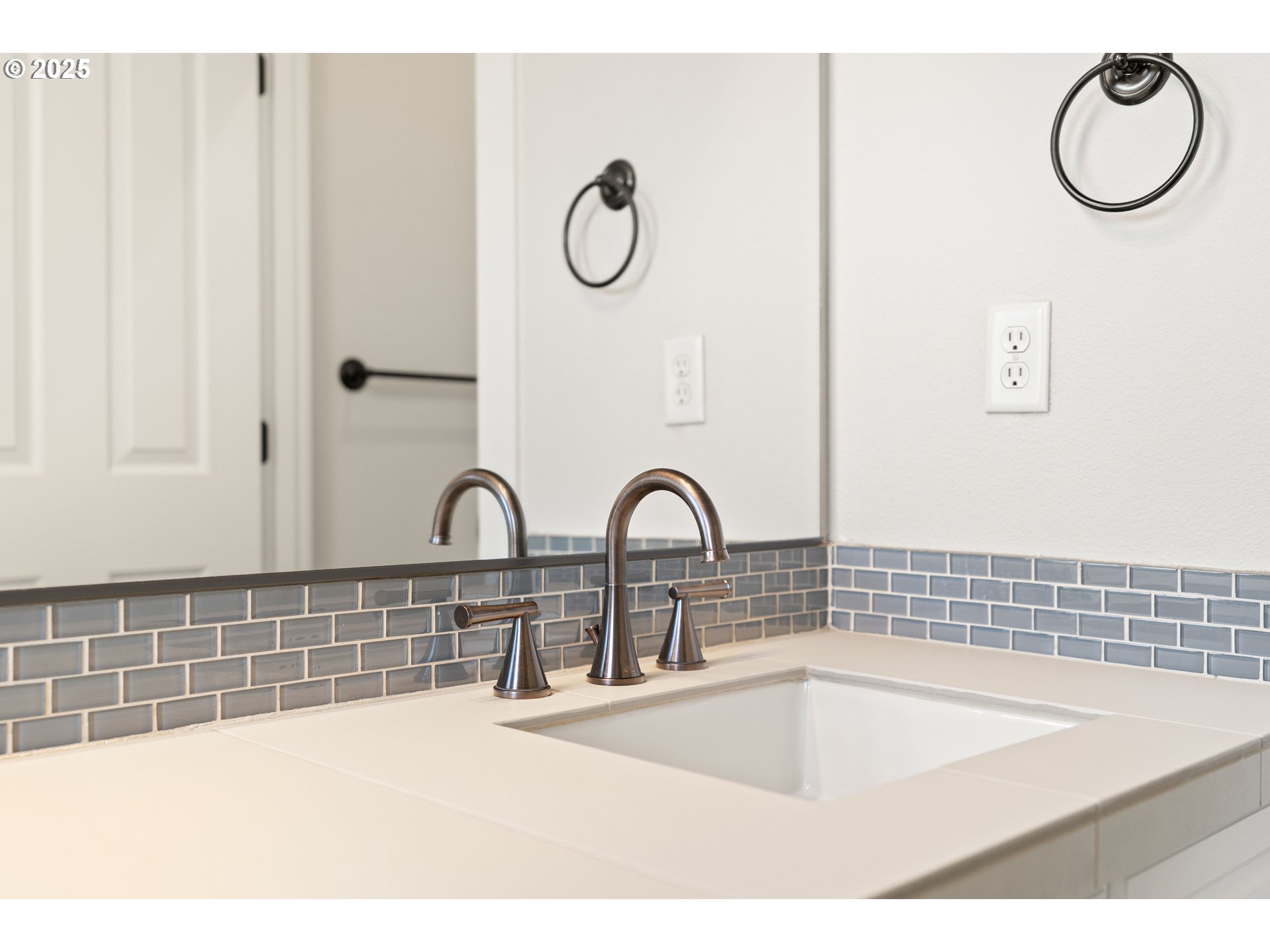 15664 Southwest Ivory Street Beaverton, OR 97007 - Photo 32 of 40 a bathroom with a sink a toilet and a tub