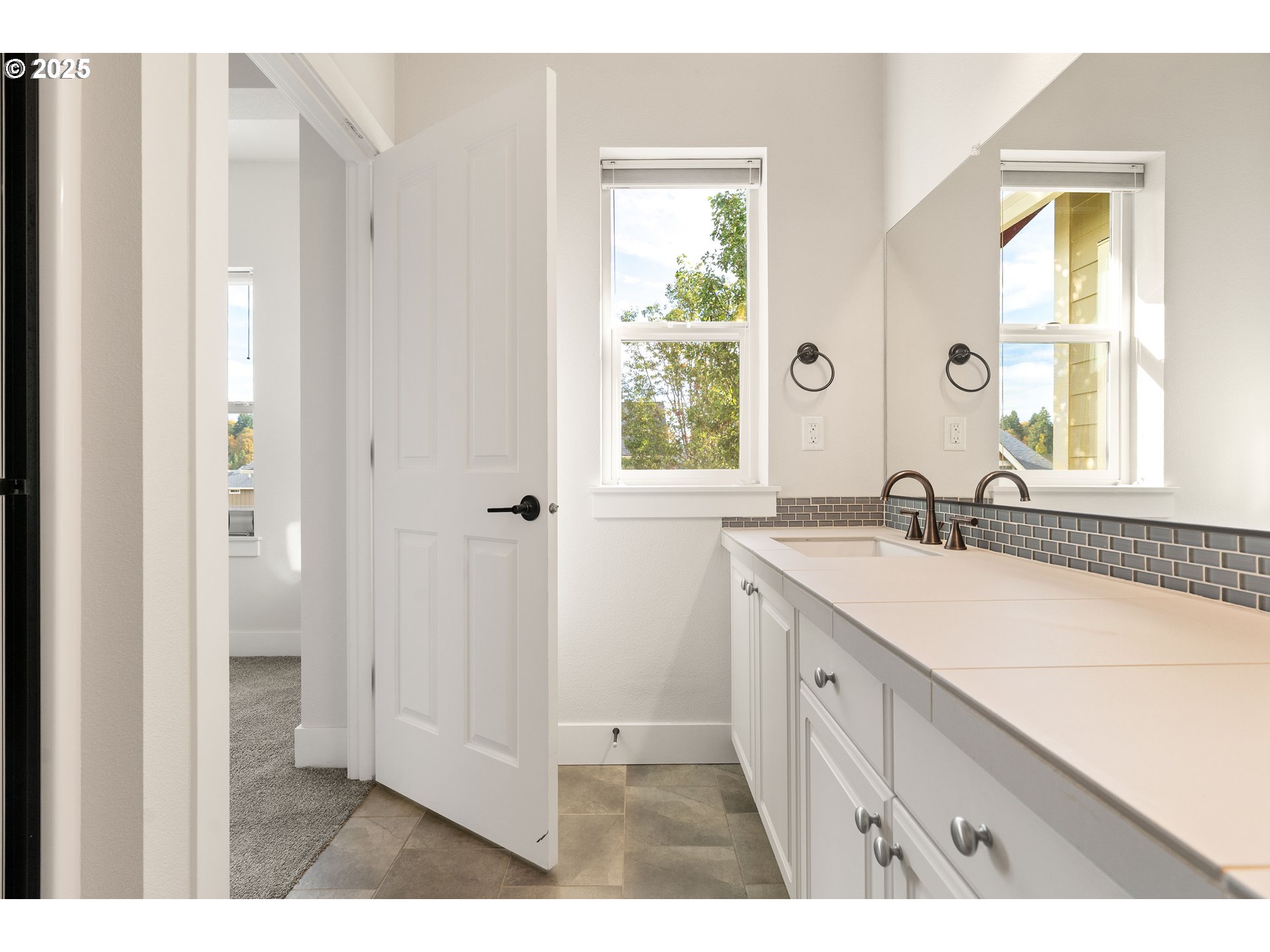 15664 Southwest Ivory Street Beaverton, OR 97007 - Photo 34 of 40 a bathroom with a sink and a mirror