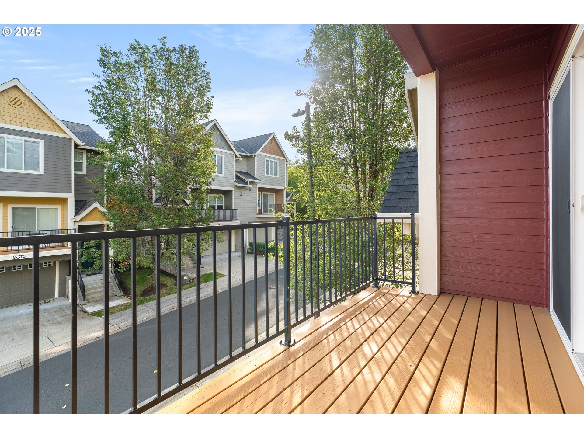 15664 Southwest Ivory Street Beaverton, OR 97007 - Photo 40 of 40 a view of balcony with wooden floor