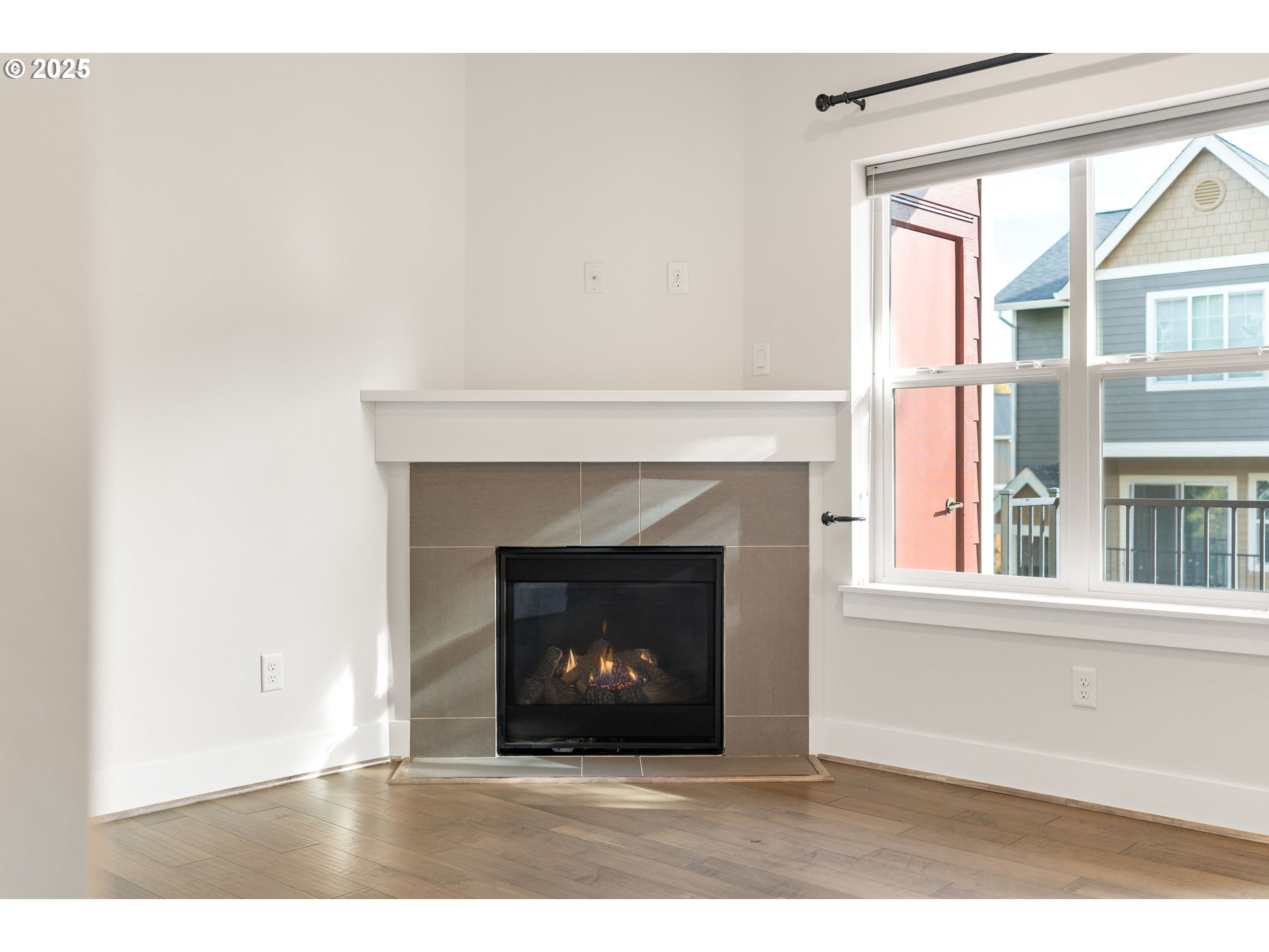 15664 Southwest Ivory Street Beaverton, OR 97007 - Photo 8 of 40 a black and white building with a fireplace