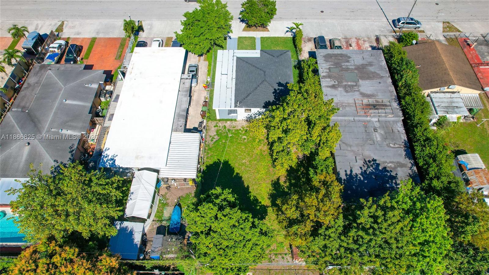 50 East 13th Street Hialeah, FL 33010 - Photo 28 of 38 an aerial view of residential house with outdoor space and trees all around