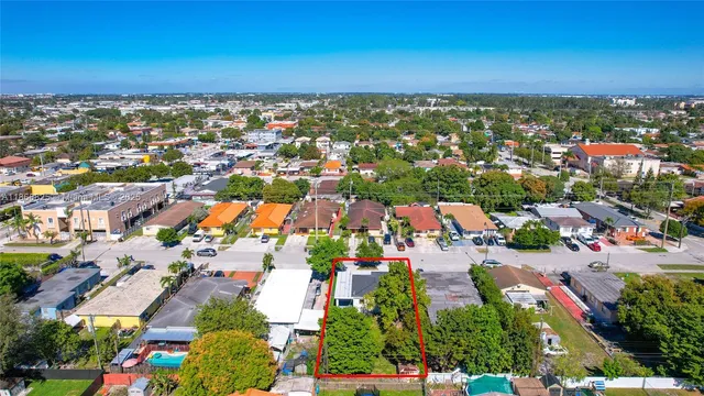 an aerial view of residential building and street