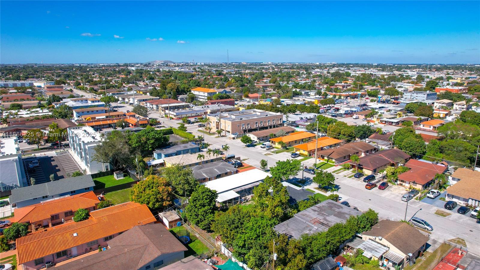 50 East 13th Street Hialeah, FL 33010 - Photo 32 of 38 an aerial view of residential houses with outdoor space