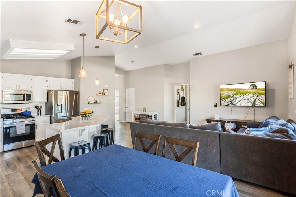 33012 Tulley Ranch Road Temecula, CA 92592 - Photo 7 of 25 a view of a dining room with furniture
