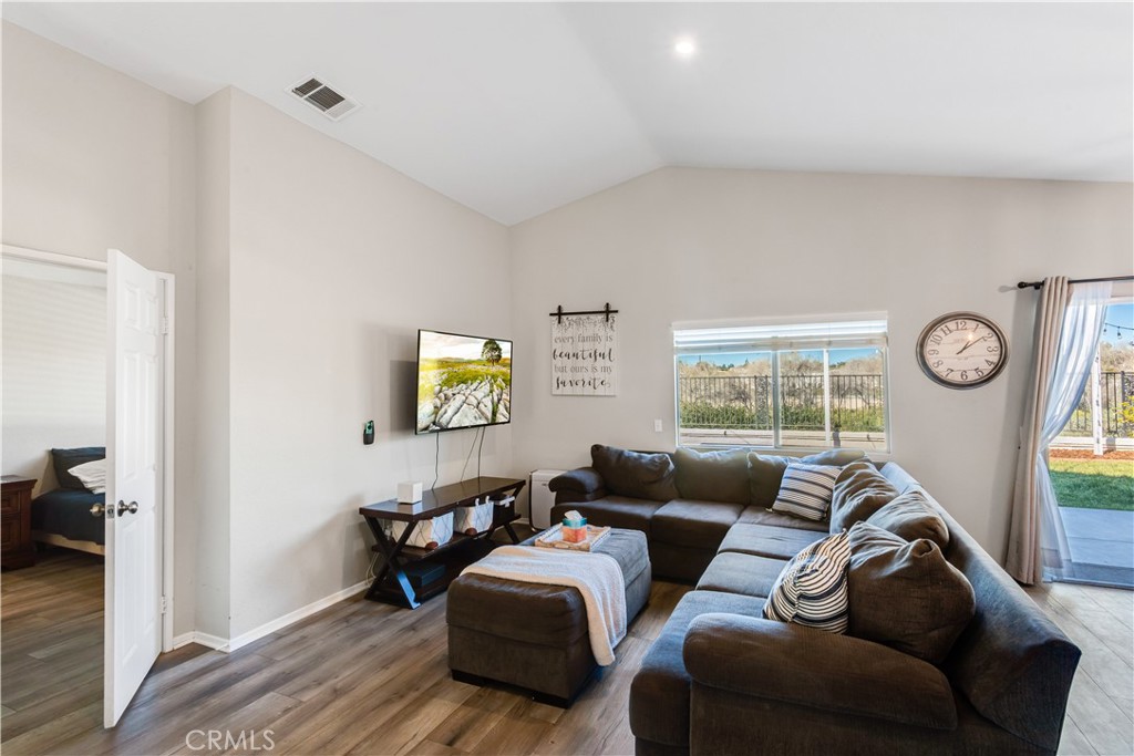 33012 Tulley Ranch Road Temecula, CA 92592 - Photo 9 of 25 a living room with furniture and a window