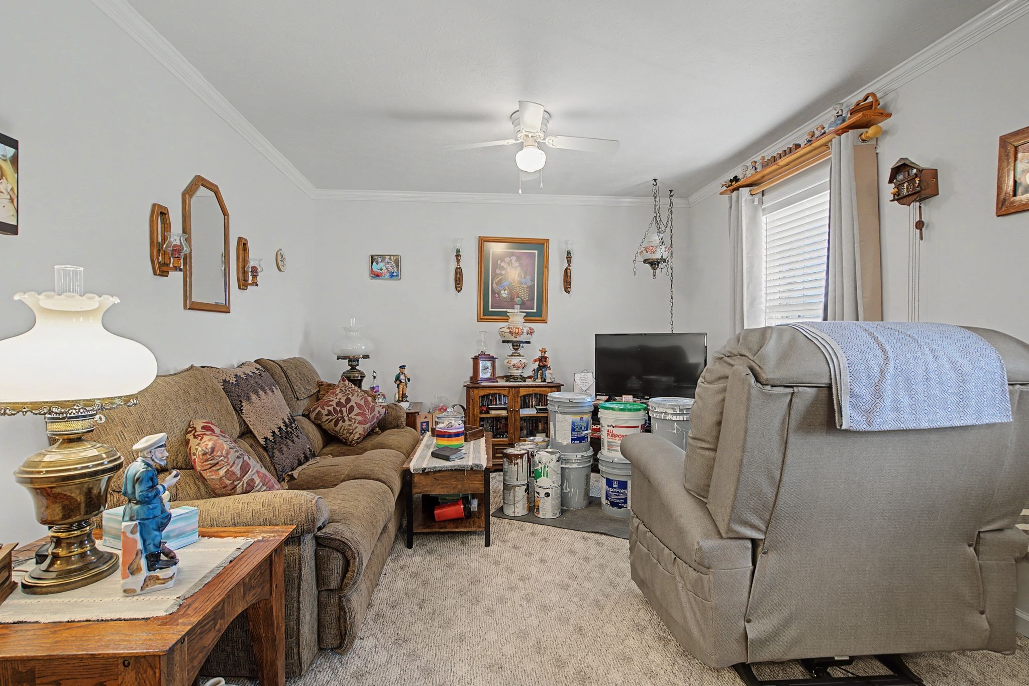 1075 Coker Ford Road Portland, TN 37148 - Photo 15 of 35 a living room with furniture and a flat screen tv