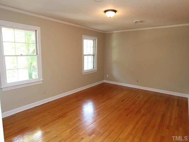 504 Northbrook Drive Raleigh, NC 27609 - Photo 10 of 16 The Master Bedroom has Sparkling Hardwood Floors, a Private Bath and 2 Separate Closets with Built Ins! Master Bedroom