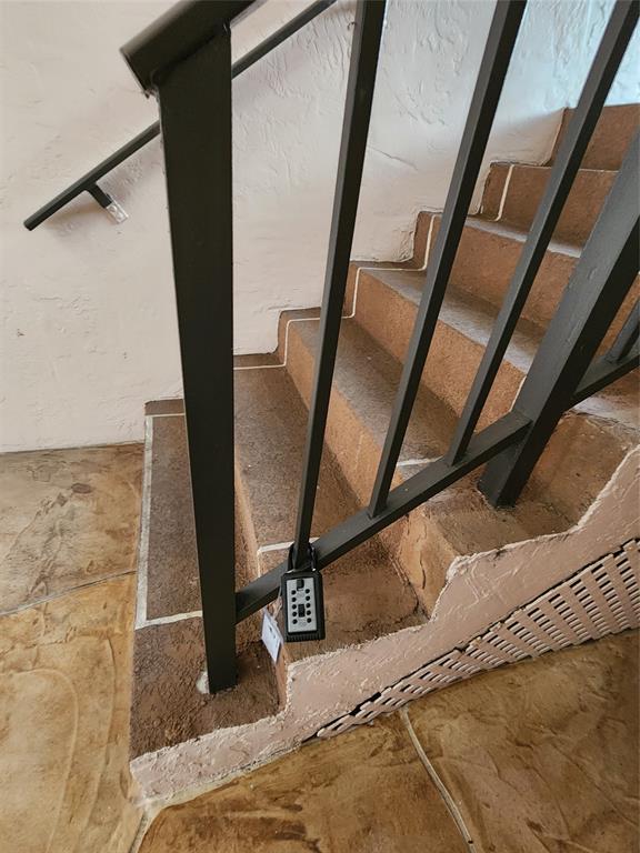 10180 Northwest 30th Court, Unit 101 Sunrise, FL 33322 - Photo 15 of 21 a view of a hallway with wooden floor and door