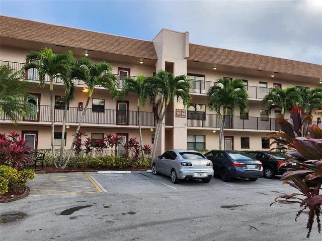 a view of a lake with a house