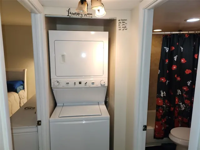 a view of bathroom with a toilet and a sink