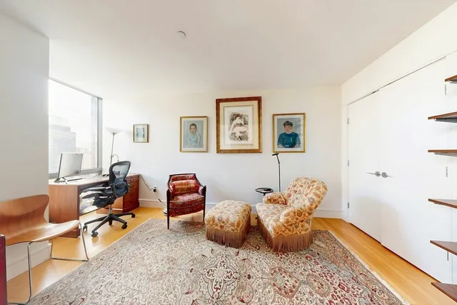 a room with furniture and a window