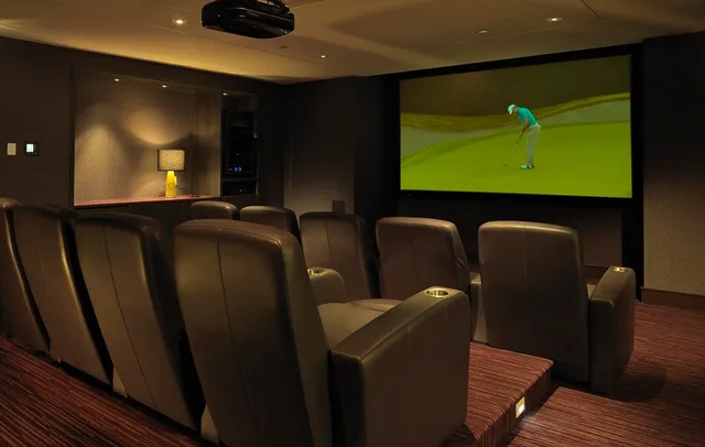 a room with wooden floor and musical instruments