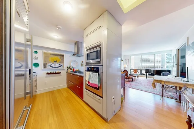 a kitchen with stainless steel appliances granite countertop lots of counter top space