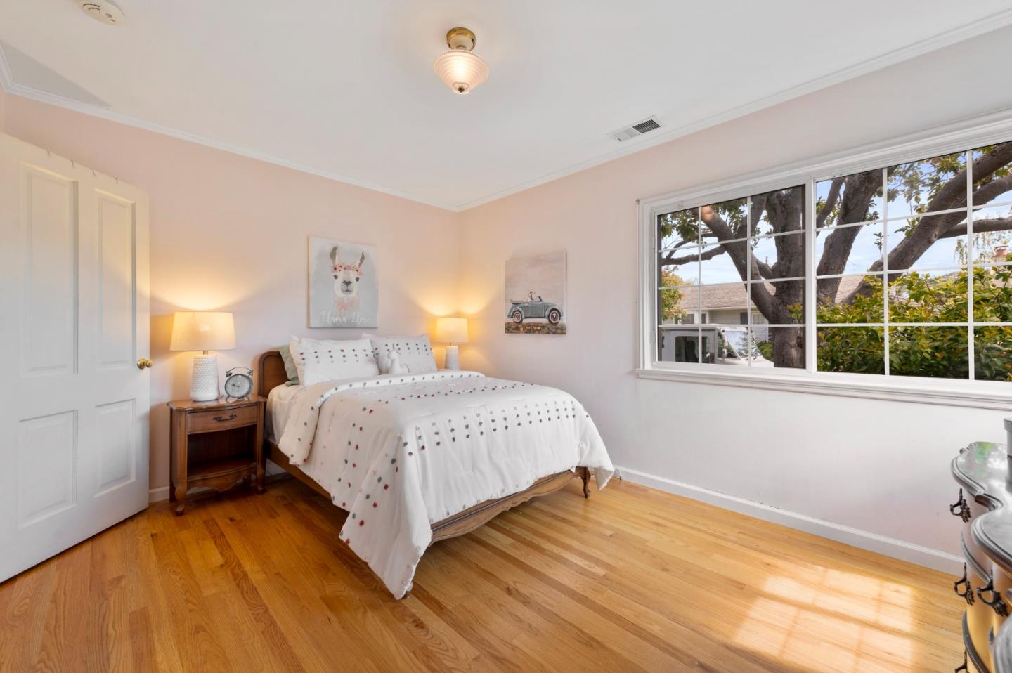 114 Arrowood Lane San Mateo, CA 94403 - Photo 18 of 28 a bedroom with a bed and a large window