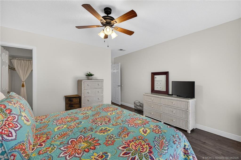 1225 Northwest 21st Street, Unit 2615 Stuart, FL 34994 - Photo 15 of 43 Primary en suite bedroom.